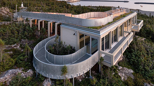 The building for observing marine mammals blends into the landscape, offering a stunning view of the St. Lawrence River.